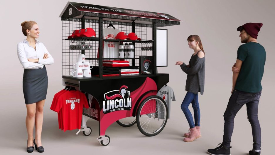 A red and black portable push cart for vending high school team swag.