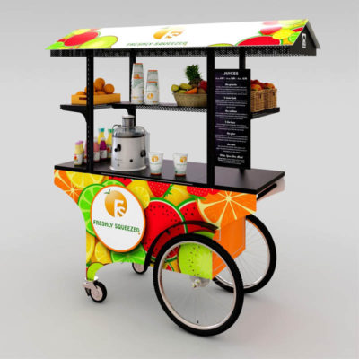 A freshly squeezed fruit beverage cart in brightly-colored, fruit-themed, custom vinyl graphics.