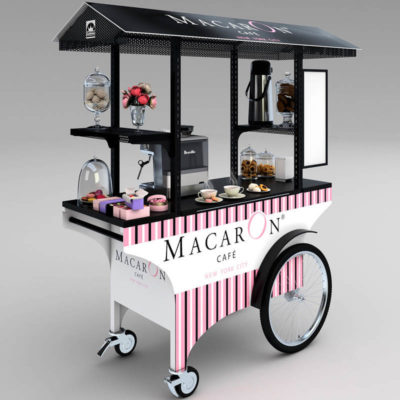 A push cart customized with a striking pink, white and black graphics wrap for a cafe