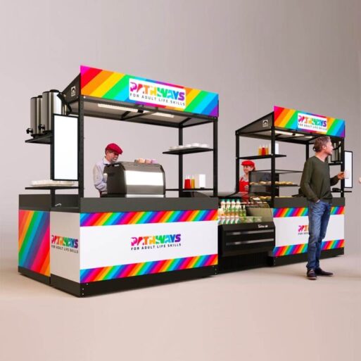 A very colorful concession stand shown with a display fridge, espresso maker, menu boards and LED ligthing.