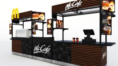 A branded food cart set up as a portable restaurant booth
