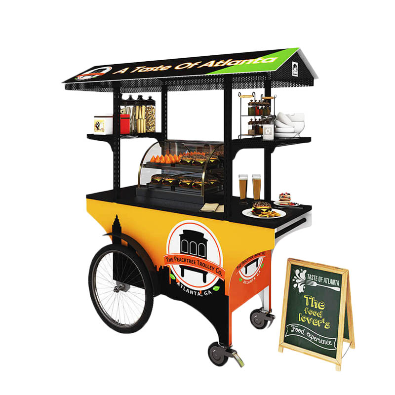 A mobile food cart in a yellow and black motif